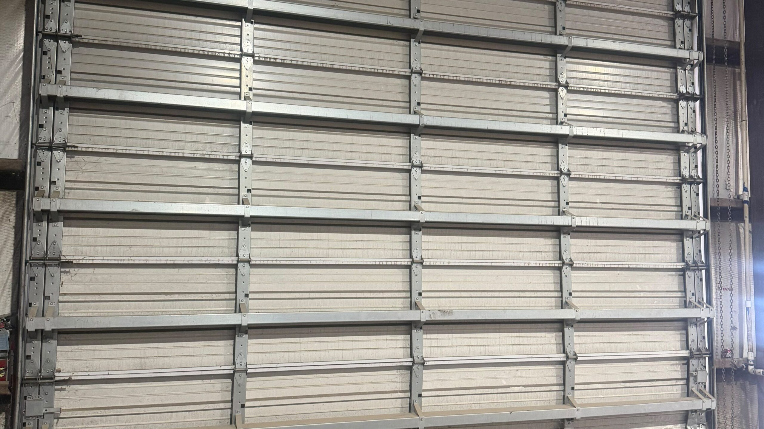 commercial garage door repair for a large industrial overhead door