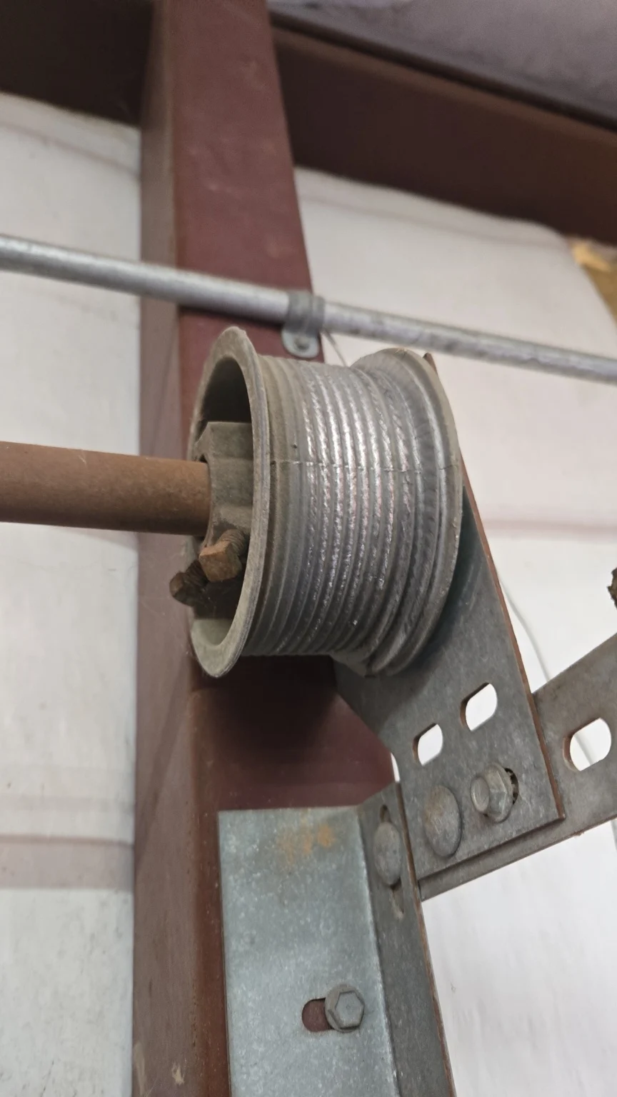 Commercial garage door cable drum in Houston, TX