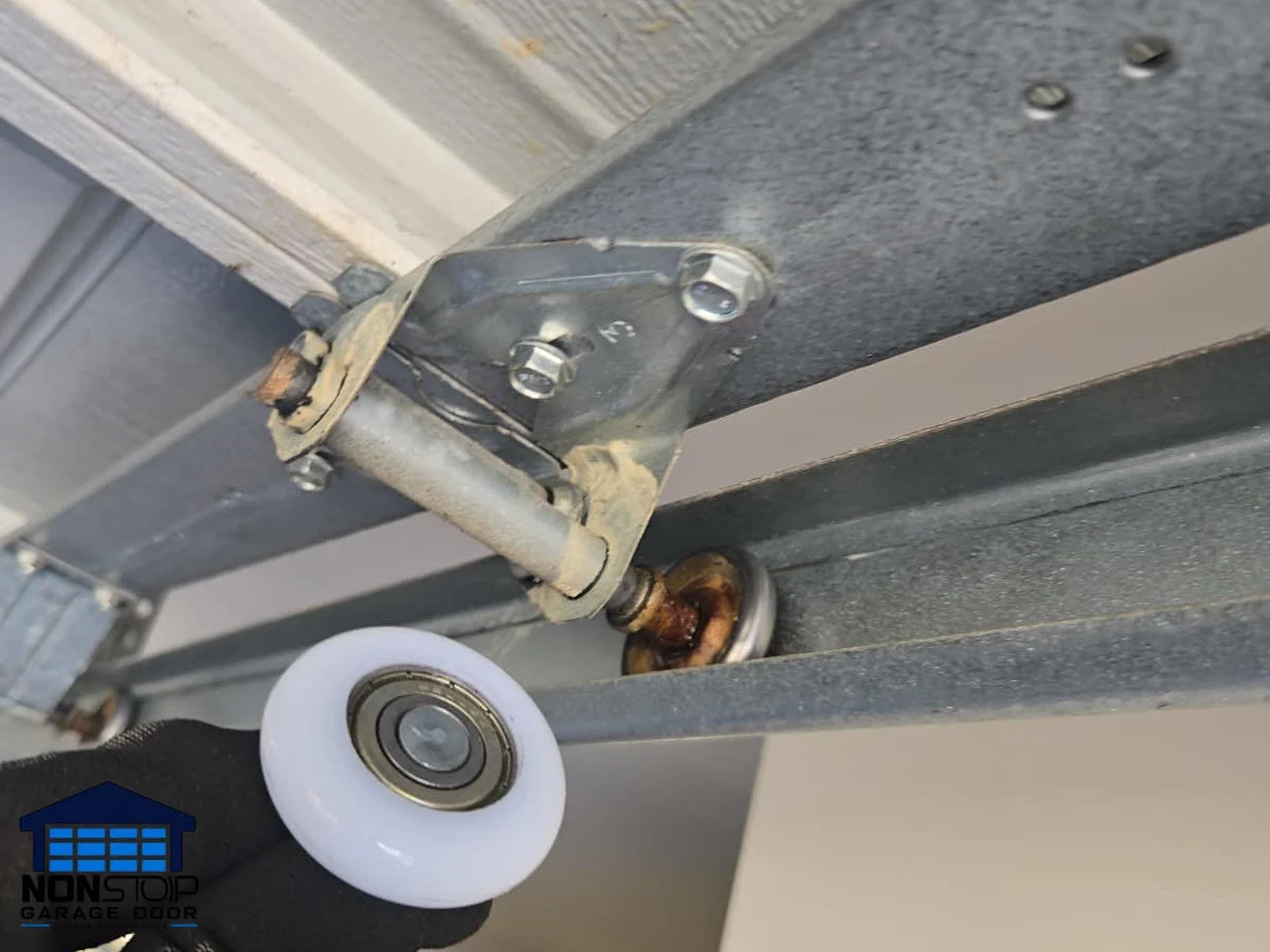 Garage door roller replacement in Houston TX by Non Stop Garage Door