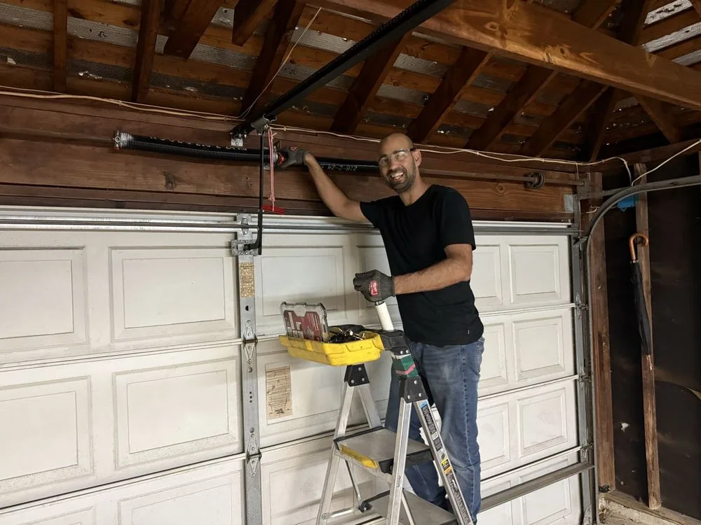 Garage door spring service in Houston TX by Non Stop Garage Door