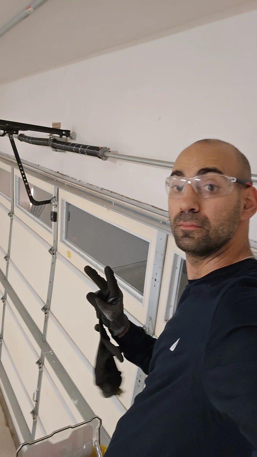 Non Stop Garage Door owner after emergency cable and spring repair in Houston, TX
