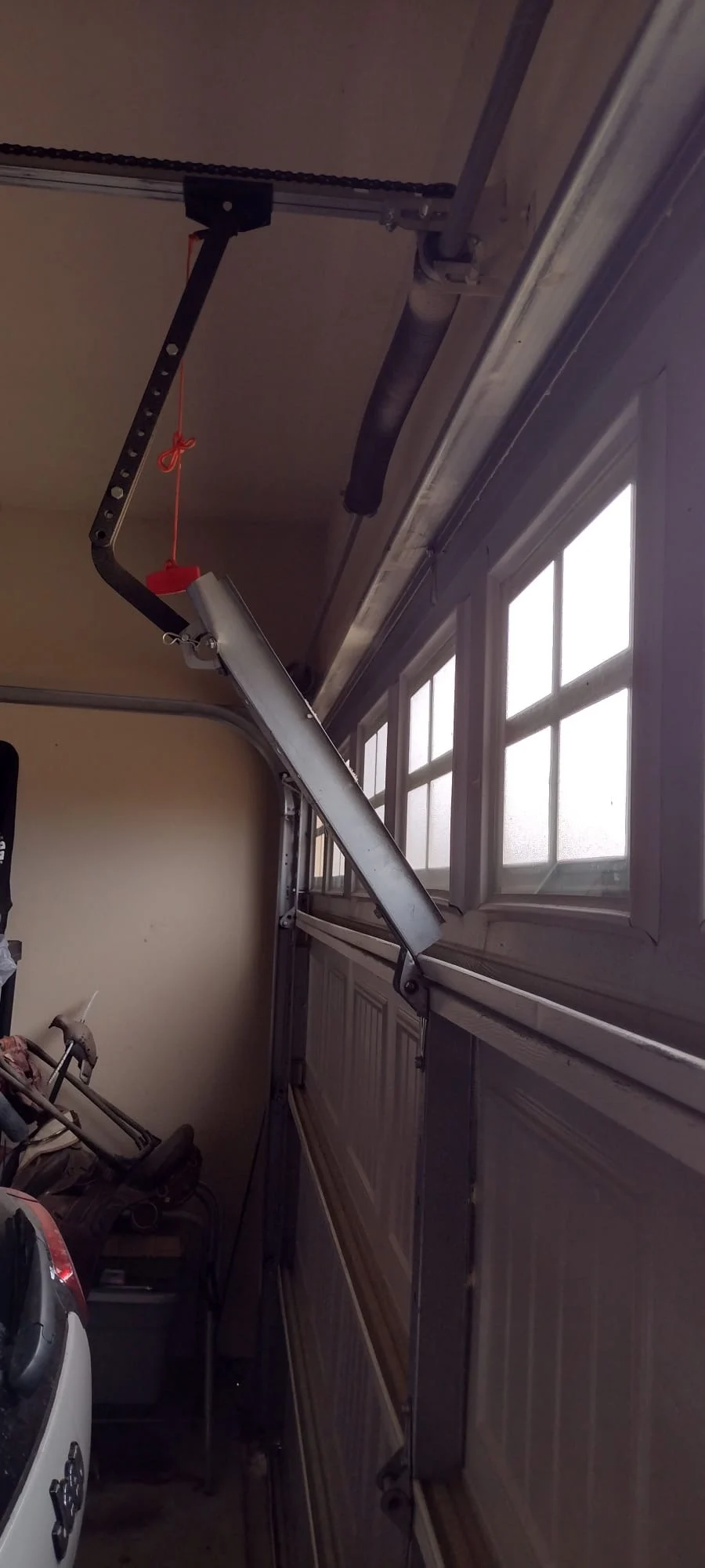 Garage door opener arm repair North Houston TX